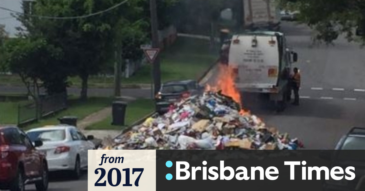 Truck dumps burning rubbish on Brisbane street